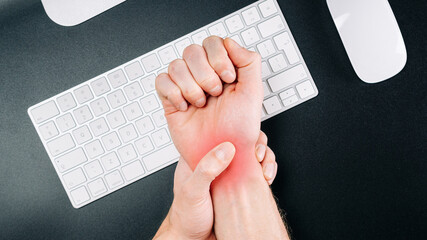 Carpal tunnel syndrome. Hand pain in man injury wrist. Arthritis office syndrome is consequence of...