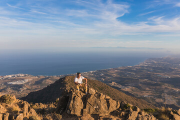 General view of a young man on top of Sierra Bermeja mountain, Malaga