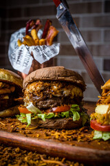 Perfect Burger Classic Bacon Homemade Artisan Tomato Sauce Sausage Melted Cheese Milk Shake Onion Chicken Meat Pasta Shrimp Restaurant Menu Gourmet on a wooden table