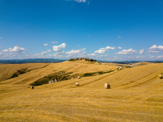 Drone Aerial beautiful tuscany countryside landscape with medieval village town in Tuscany. South of Siena, Italy