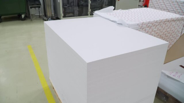 prepared stack of paper for printing books. plant for the production of books, magazines and newspapers. print material