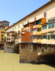 Fototapeta na wymiar The colorful bridge Ponte Vecchio in Florence Italy.