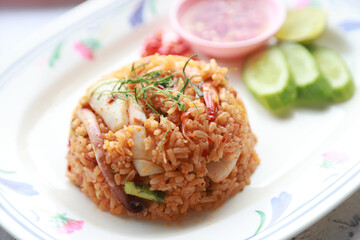 Spicy fried rice with seafood squid, shrimp and chilli. Favorite spicy food in Thailand