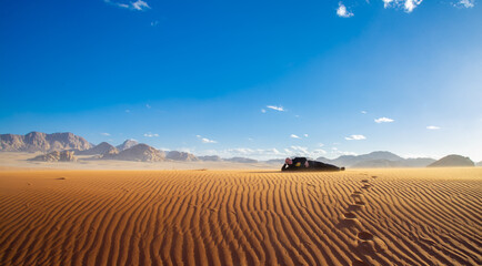 50 year old man photographed in the desert while hiking in Jordan Wadi Rum desert 