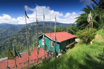 Beautiful way to Okhrey village, colourful Buddist prayer religious flags waving in strong wind....