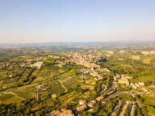 Aerial/Drone panorama of San Gimignano in the tuscany and its vineyards and olive trees, Tuscany Italy	