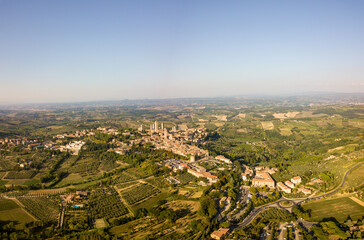 Aerial/Drone panorama of San Gimignano in the tuscany and its vineyards and olive trees, Tuscany Italy	