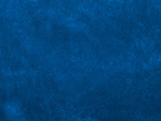 Fototapeta na wymiar Dark blue velvet fabric texture used as background. Empty dark blue fabric background of soft and smooth textile material. There is space for text..