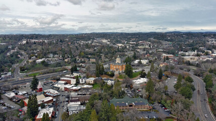 Downtown Old Auburn California with view of the Sierra Nevada Mountains. The Old Courthouse was recently renovated and is still a functioning government building. 