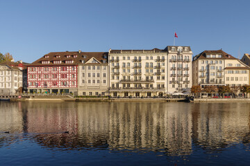 Fototapeta na wymiar Lucerne, Switzerland, View of historical buildings along riverside