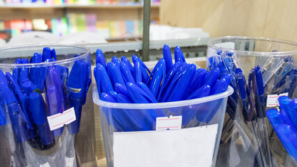 ballpoint pens in the store shelf. shelf in a stationery store.
