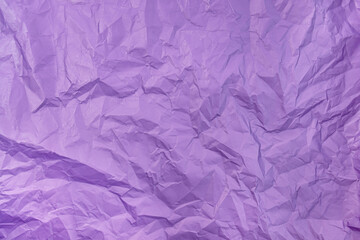 Texture of purple crumpled paper. Selective focus.
paper textures and backgrounds. Surface of crumpled purple paper.
