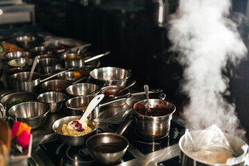 There are a lot of sauces and dishes for visitors of the restaurant.