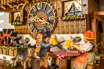 Cuckoo Clock with people drinking beer with their dog