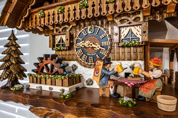 Cuckoo Clock with people drinking beer with their dog