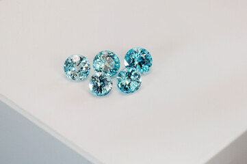 Natural zorcon round gemstones set lot. Electric blue white color zones. Heat treatment applied....
