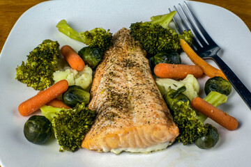 season salmon fillet with  mixed vegetables