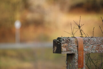 close up of a wooden part of a railing