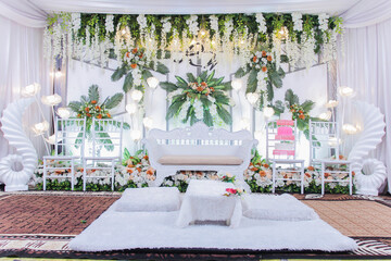 wedding decoration with white theme and fresh leaves, 15 January 2021 Tenggarong city, East...