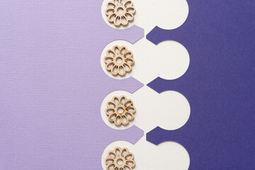 purple and white paper background with wooden floral elements