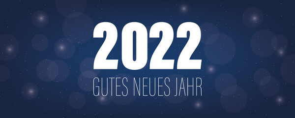 Gutes neues Jahr 2022. Banner vor Hintergrund mit Sternenhimmel und Bokeh.