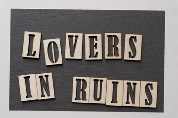 the expression "lovers in ruins" on paper