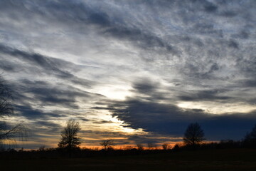 Fototapeta na wymiar Dramatic Sunset with Clouds