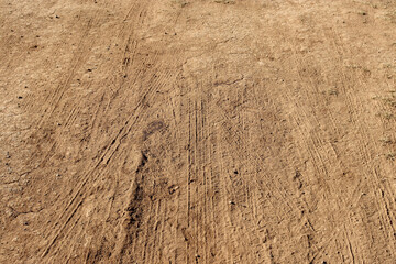 tyre tracks on dirt road