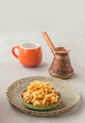Chak-chak  and coffee on a gray background