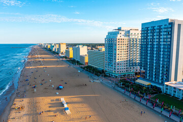 Aerial view of the Virginia Beach oceanfront looking south at sunset - obrazy, fototapety, plakaty