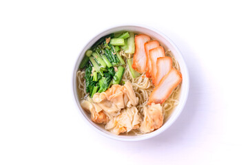 Noodles soup with wonton dumpling and grilled red pork in bowl on white background, Asian food, Top view