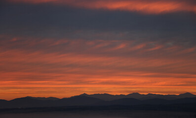 Beautiful sunrise where you can see the wonderful colours going up the mountain in Chile.