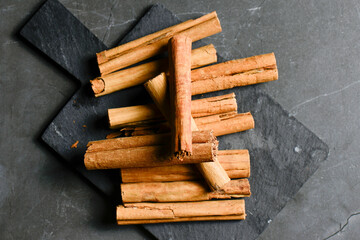 Group of Cinnamon Sticks also known as quills are dried strips of bark from the cinnamon tree.