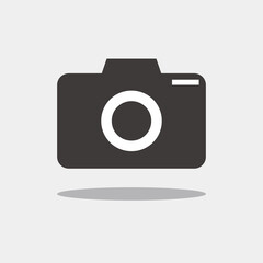 Shaded camera icon isolated on a gray background.