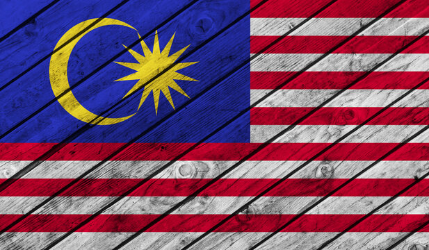 Malaysia flag on wooden background. 3D image