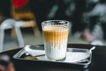 coffee latte or Dirty which mixing milk and espresso shot in a glass