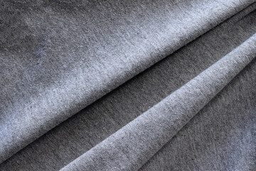 Elegant grey silk, luxurious fabric texture, elegant background design.