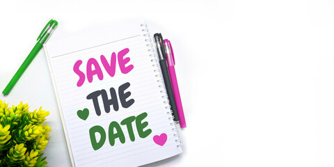 SAVE THE DATE - text on paper with white background. copy space background.