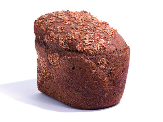 A loaf of rye bread on a white background. Freshly baked traditional bread. Natural food products. A loaf of black bread with a sprinkle of bran on white
