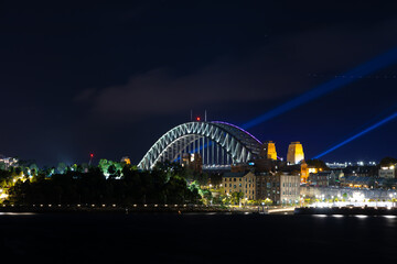 Naklejka na ściany i meble Sydney Harbour Bridge New Years Eve fireworks, colourful fire works lighting the night skies with vivid multi colours