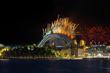 Sydney Harbour Bridge New Years Eve fireworks, colourful fire works lighting the night skies with vivid multi colours