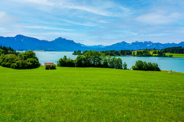 Forggensee - lake near Fuessen in beautiful mountain scenery of Allgaeu Alps, Bavaria, Germany