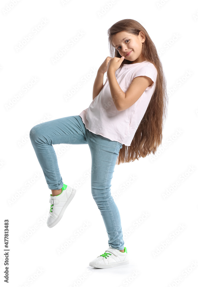 Sticker cute little girl in t-shirt dancing on white background