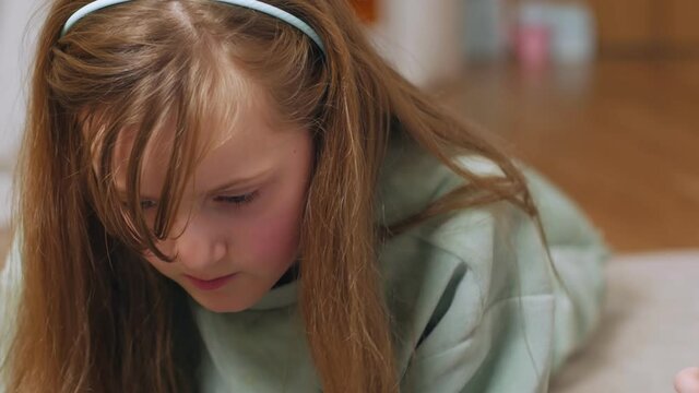 Girl with a tablet close up