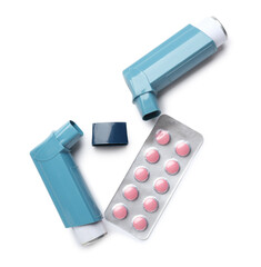 Modern asthma inhalers and blister pack of pills on white background
