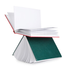 Flying books with blank pages on white background