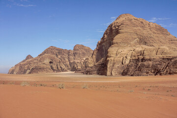 Fototapeta na wymiar beautiful red weathered mountains in the desert, wadi rum desert, Jordan