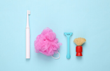 Products for your own hygiene on a blue background. Top view. Flat lay