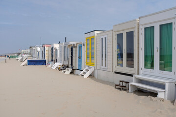 Obraz na płótnie Canvas Beach houses on the beach of Wijk aan Zee, Noord-Holland Province, The Netherlands