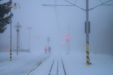 Dark winter on the railway station 